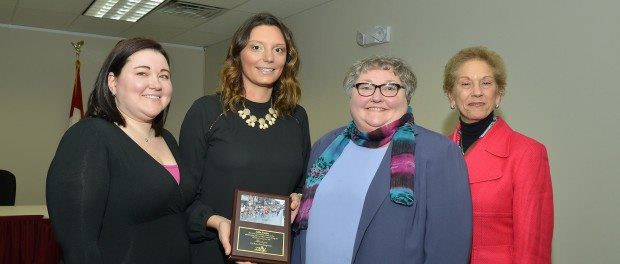 Left to right: Nurse Manager Kimberly Morrison, Cardiac Critical Nurse Julia Palma, Director of Critical Care/Cardiac Services Michele Van Buren, and St. Peter's Hospital CEO Ann Errichetti share a smile at the ceremony to recognize Palma and three others who saved a man's life at the Troy Turkey Trot race in November 2015.