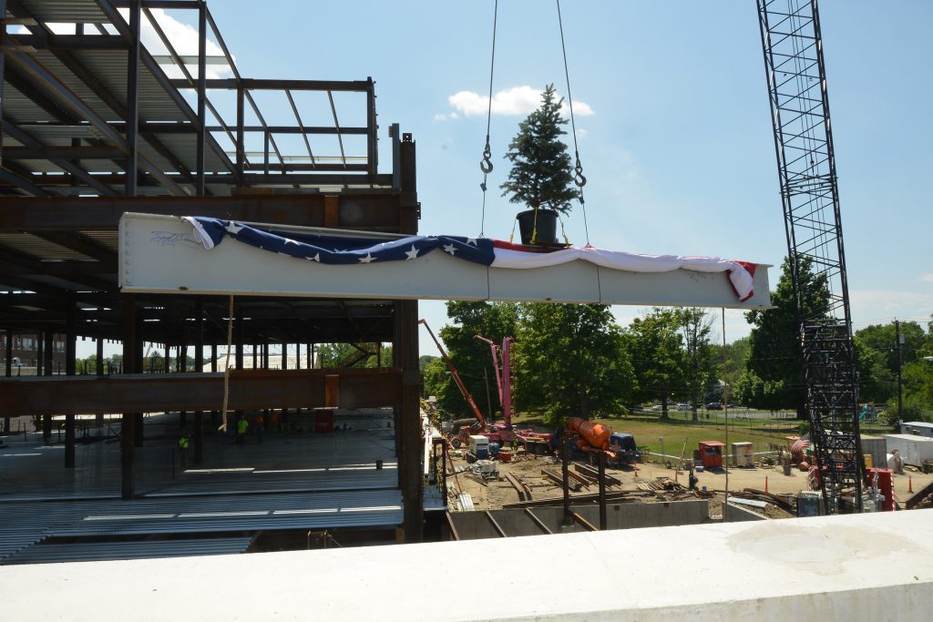 St. Peter’s Health Partners celebrated a major milestone in its $99 million Troy Master Facilities Plan with a “topping off” ceremony, lowering the last beam atop the framework of the new, five-story patient pavilion being constructed on the Samaritan Hospital campus. 