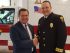 Norman Dascher, CEO of Samaritan Hospital and St. Mary's Hospital, stands with Forest Weyen, executive director of the Bennington Rescue Squad, at a ceremony on May 22 to celebrate the squad receiving a Mission Lifeline Gold Award from the American Hearty Association.