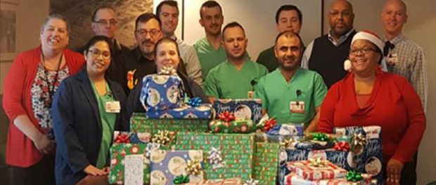 The SPHP Clinical Engineering team's contributions led to a donation of more than $500, which included many wrapped gifts as well as a $100 check, for the adopted family.