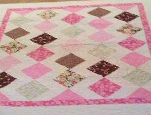 Nancy Larrow made and raffled a special quilt with the theme of breast cancer awareness. She raised $500, and donated the money to patients of St. Peter’s Hospital Breast Center. 